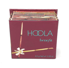 Benefit Hoola bronzing powder swatches on cheek illustrate subtle contour