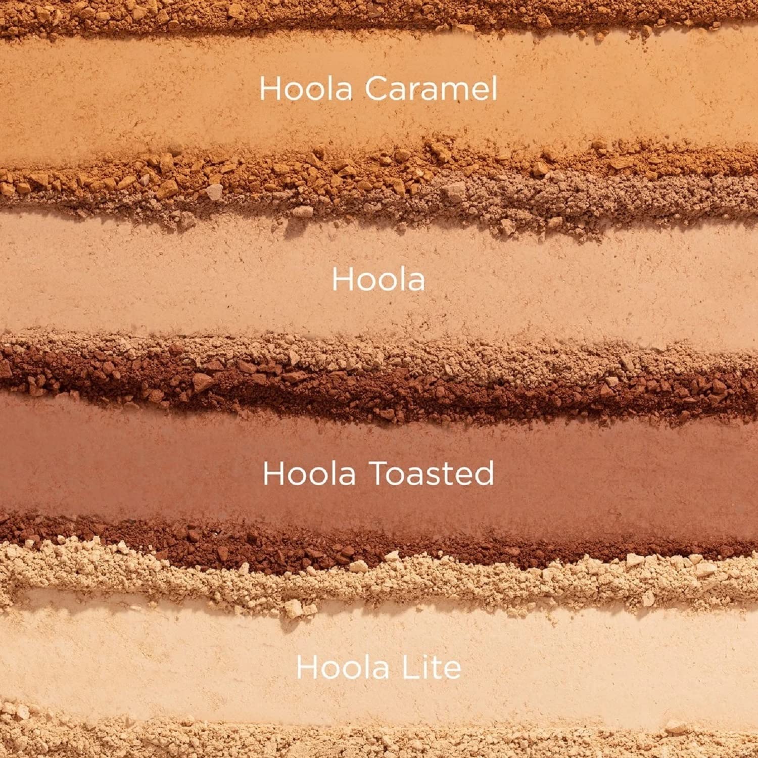 Benefit Hoola Caramel compact beside makeup brush showing compact size and everyday use