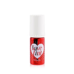 Benefit love tint fieryred lip and cheek in use model applying color for coordinated, long-lasting look