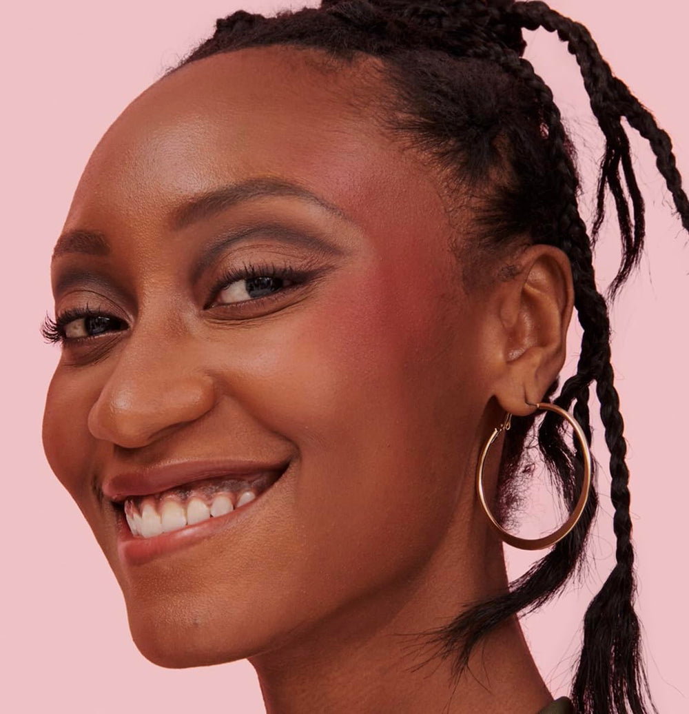 Benefit Moone brush swipe showing buildable color payoff and smooth application