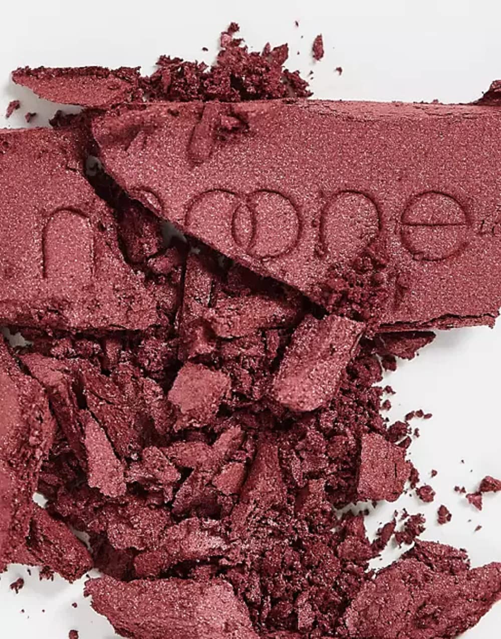 Benefit model wearing Moone blush demonstrating wearable berry color for everyday looks benefit
