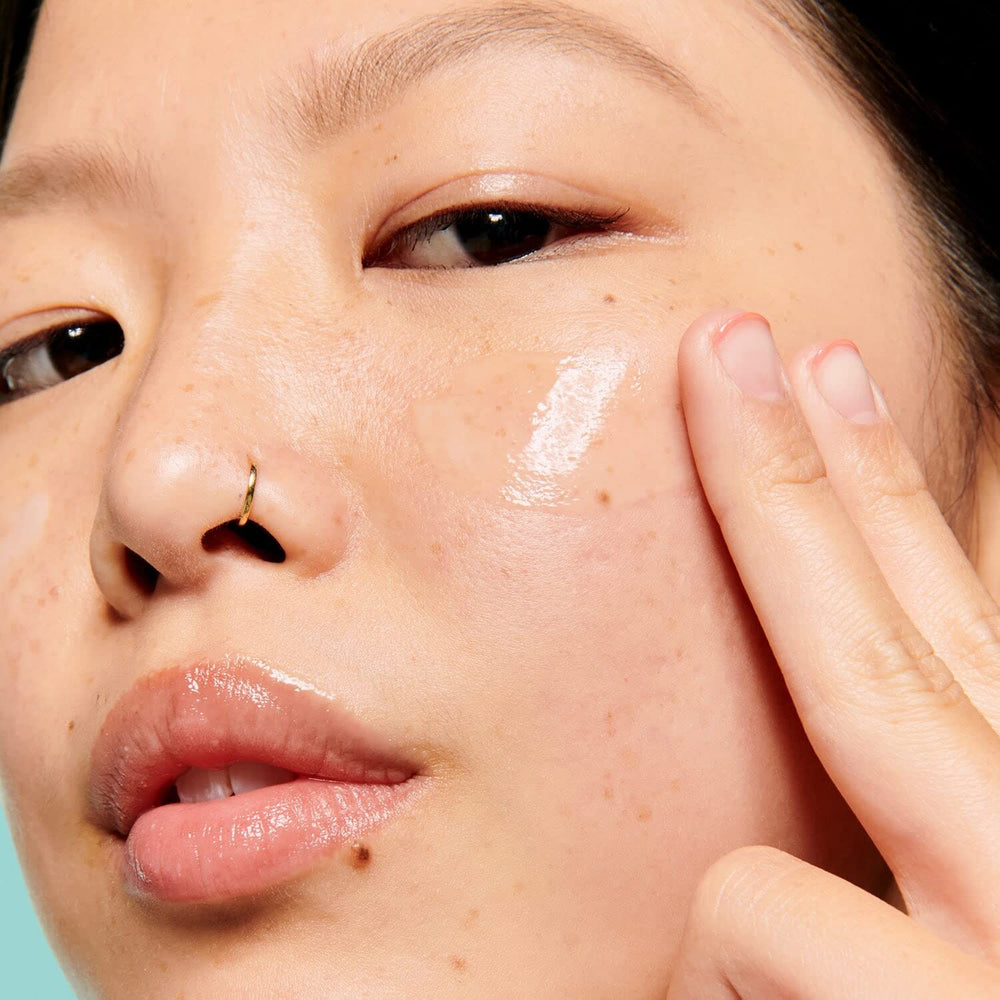 Benefit product label close-up showing ingredient highlights and clean formulation