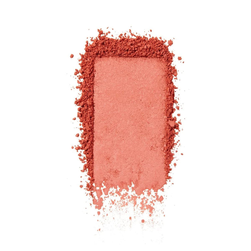 Benefit close-up of silky powder texture highlighting blendability and soft finish