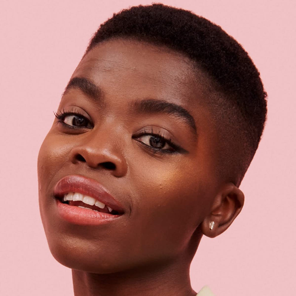 Benefit close-up of silky-soft powder texture illustrating blendable finish