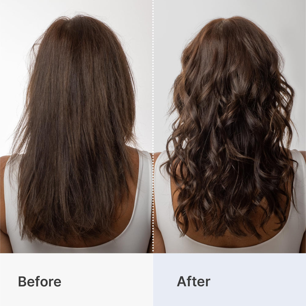 Hands applying Better Not Younger mousse on damp hair for added body.