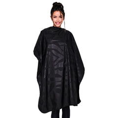 Betty Dain bleach-proof cape folded for storage, ready for quick salon setup.