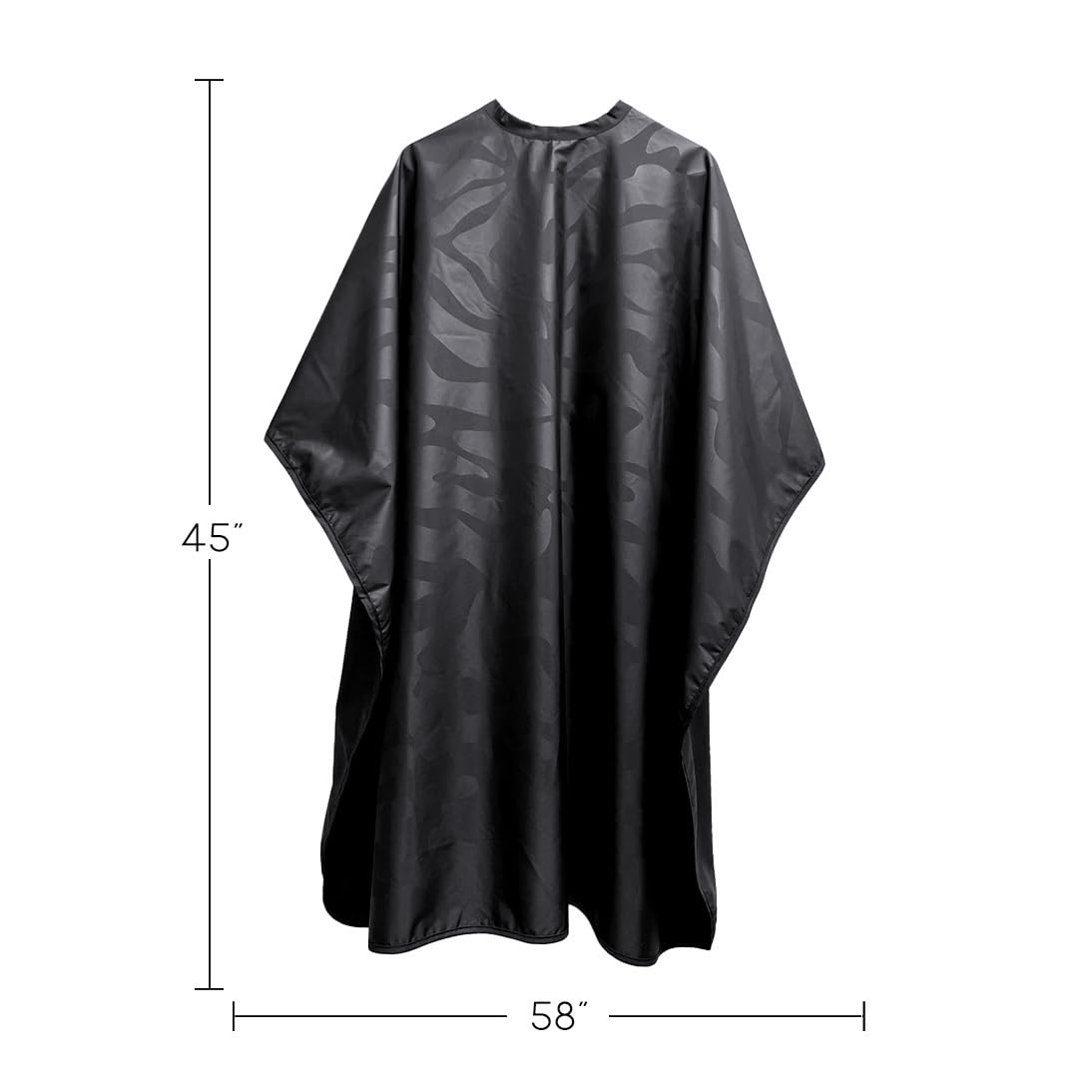 Betty Dain cape with snap-neck closure in use during appointment.