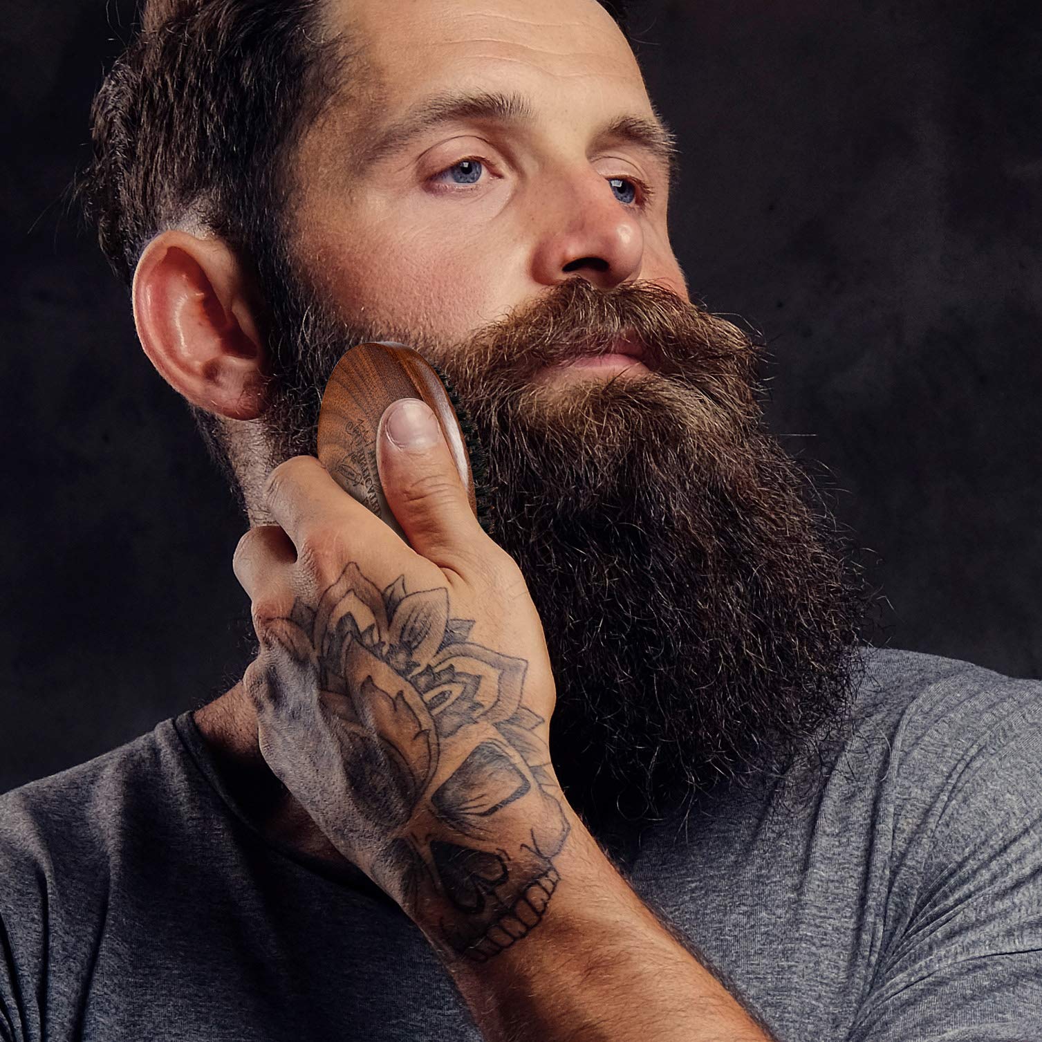 BFWood boar-bristle brush in use helps tame facial hair with gentle pressure.