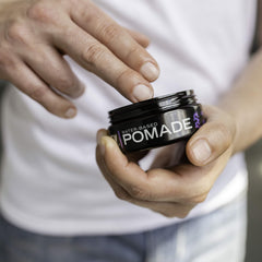 Billy Jealousy Lunatic Fringe pomade jar side view highlights easy wash-out formula