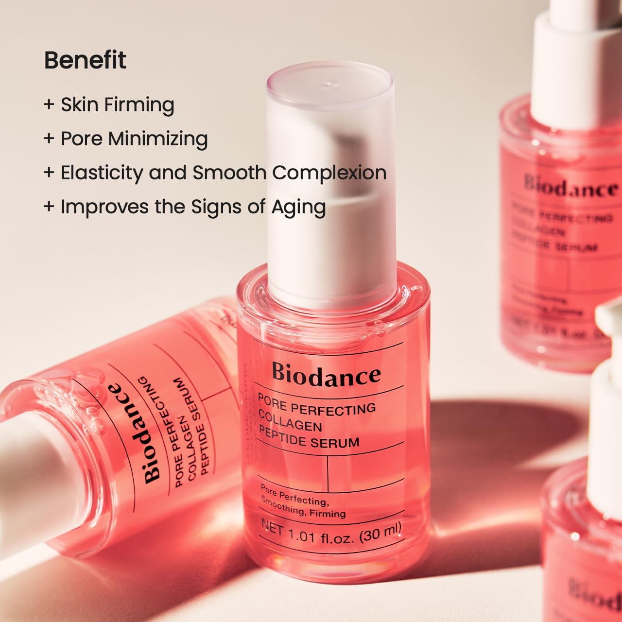 BIODANCE bottle in hand to show 1.01 fl.oz scale and travel-friendly size
