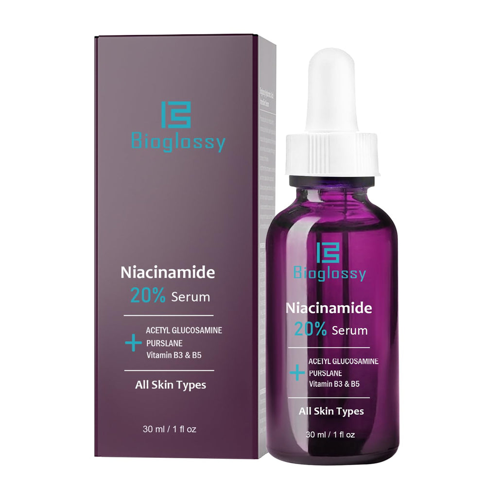 Bioglossy Niacinamide Serum glass bottle on vanity counter.