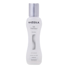 BioSilk Silk Therapy Original bottle pouring for a shine boost and smooth strands.