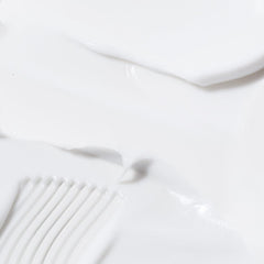 BIOSSANCE Squalane + Omega Repair Hand Cream being applied to hands for day-and-night hydration.
