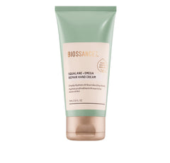 BIOSSANCE Squalane + Omega Repair Hand Cream packaging close-up, eco-friendly design for on-the-go hydration.