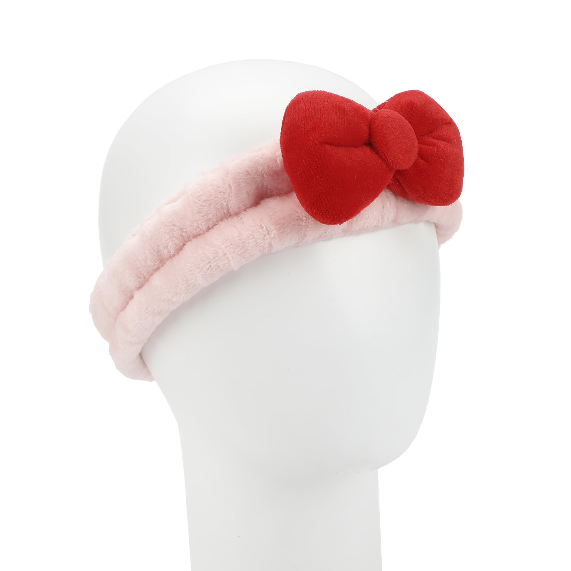 Bioworld Hello Kitty closeup pink towels emphasizing soft texture and character.