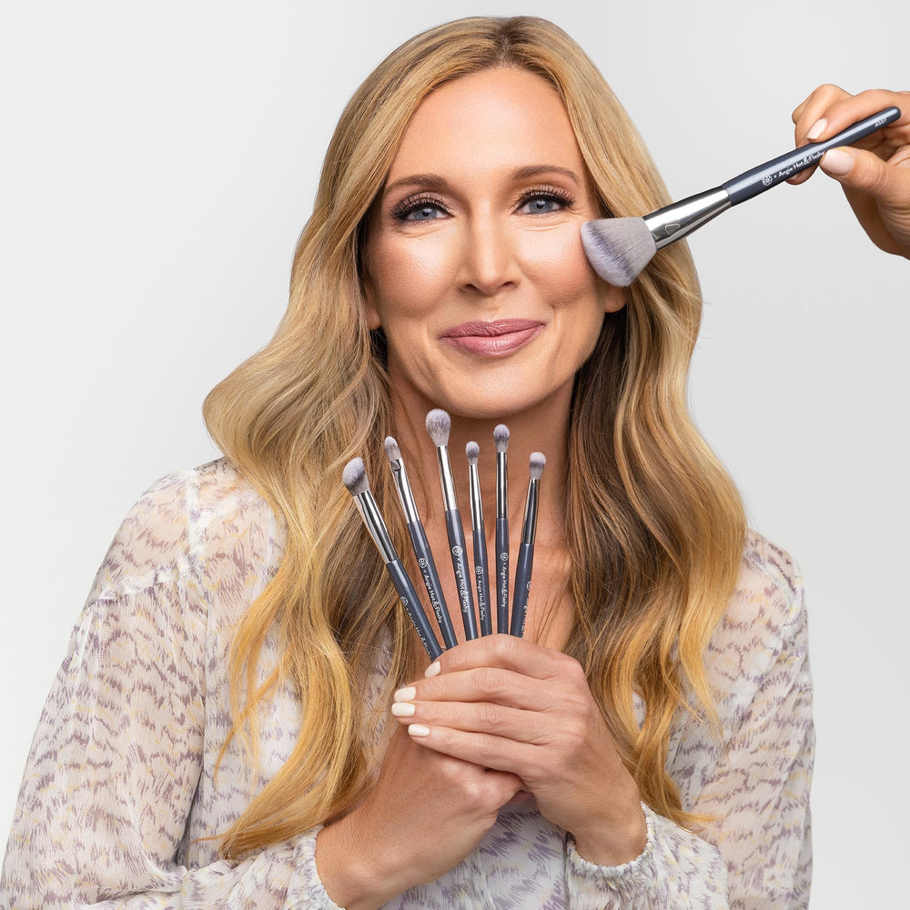 BK Beauty Angie A507 angled brush applying bronzer along cheekbone for contour.