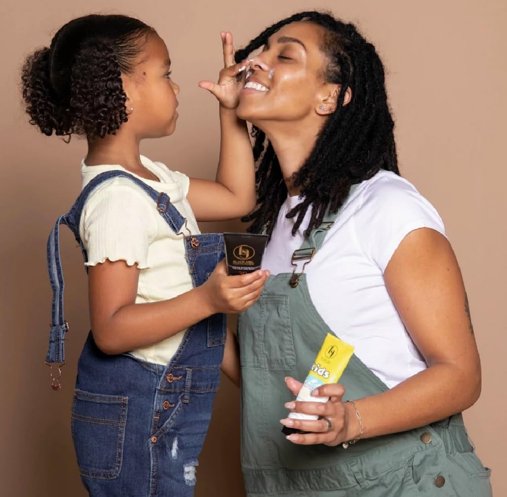 BLACK GIRL SUNSCREEN Large Kids SPF 50 no-white-residue swatch on skin.