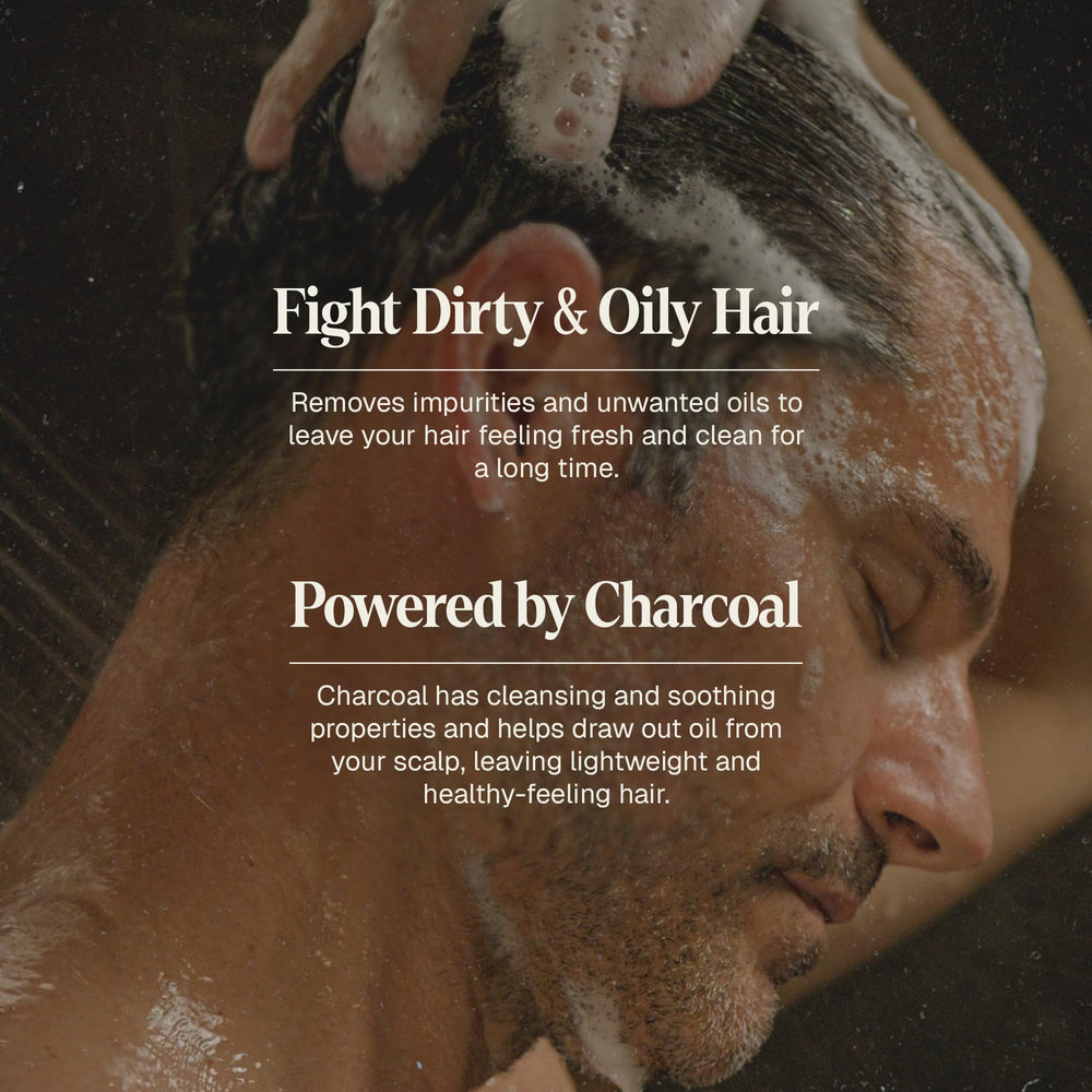 Black Wolf charcoal-infused shampoo closeup lather shows rich, sulfate-free foam.