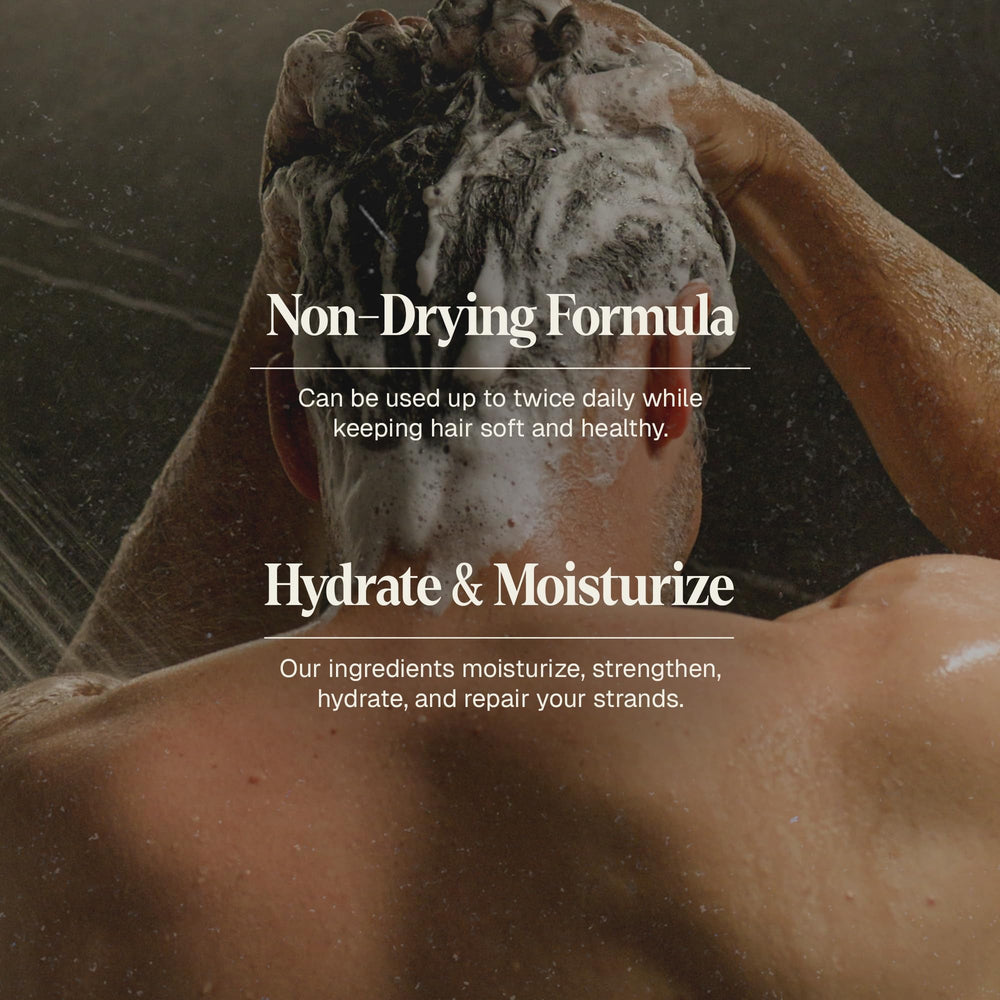 Black Wolf shampoo bottle with fragrance notes bourbon and tobacco for a refreshed shower.