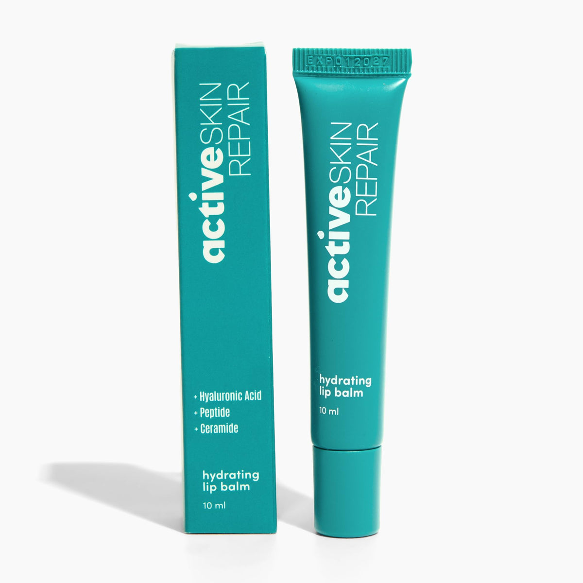 BLDG ACTIVE lip balm tube outer packaging showing long-lasting hydration for dry lips.