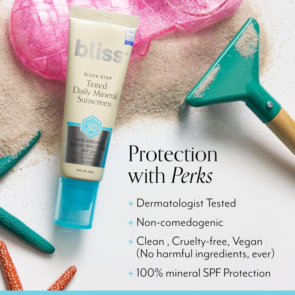 Bliss Block Star tinted sunscreen swatch on arm highlights natural look.