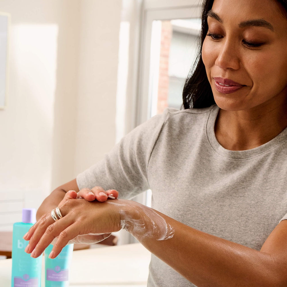 Bliss Body Butter application on arm shows non-greasy absorption.