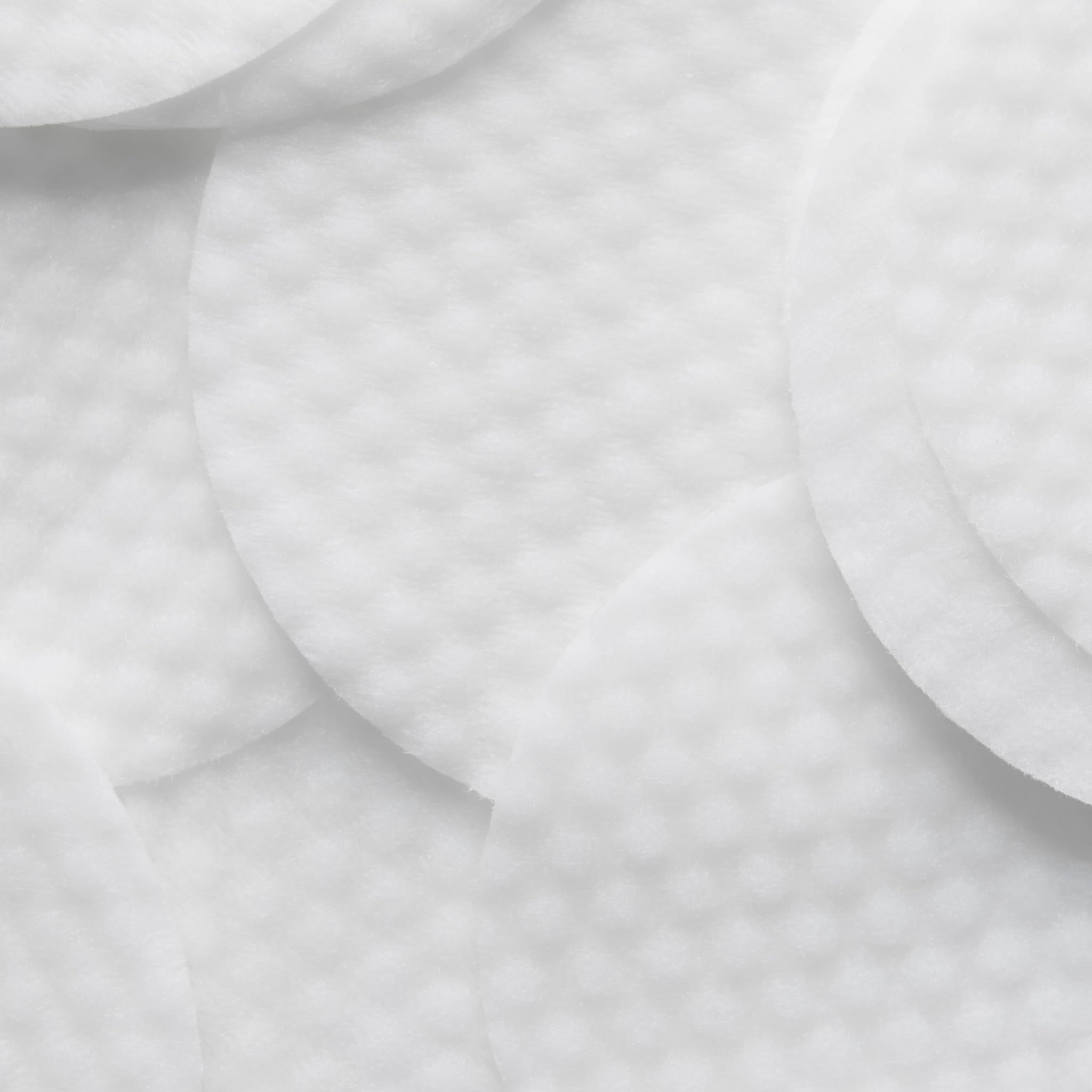 Bliss dark spots area treated with toner pad for targeted brightening.