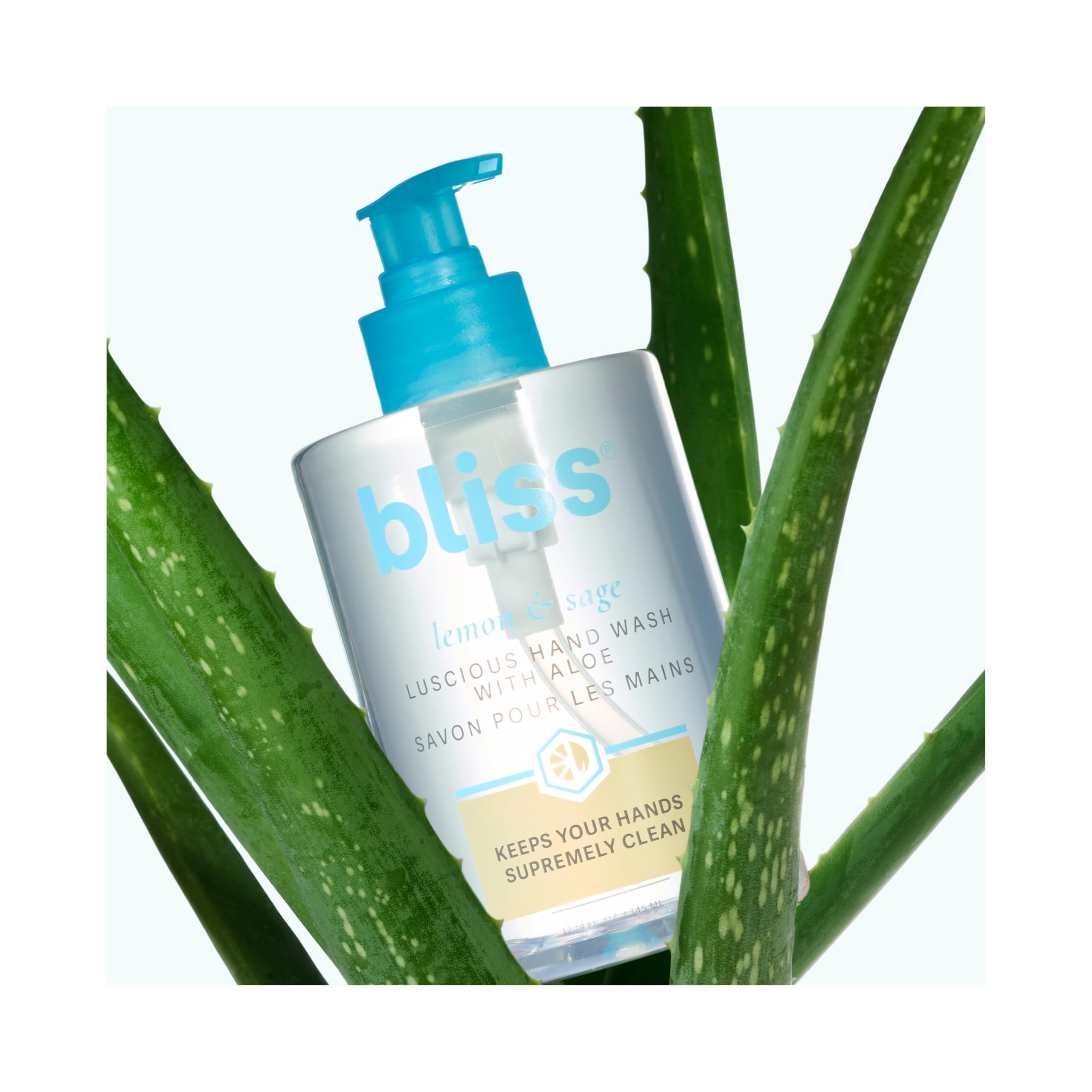 Bliss Lemon & Sage Hand Wash bottle with refreshing aroma in a bright bathroom.