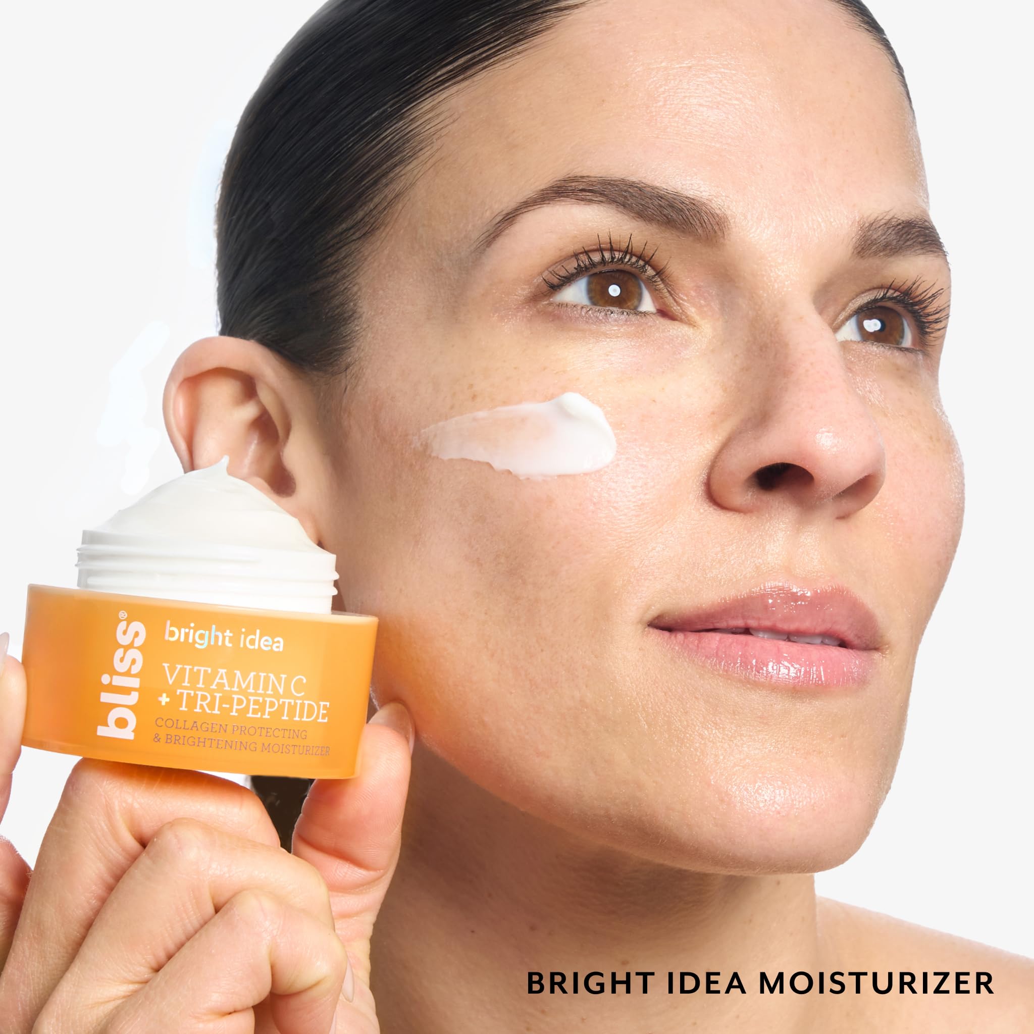 Bliss Vitamin C + Tri-Peptide Brightening Moisturizer label detail highlights clean vegan formula.