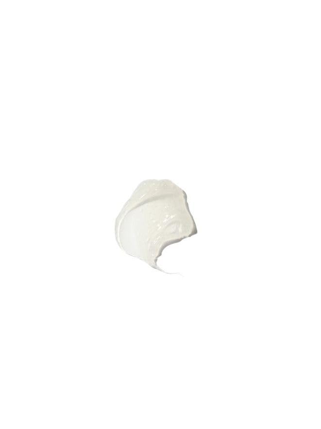 Blue Lagoon Iceland lip balm close-up shows creamy texture and moisture ready for lips.