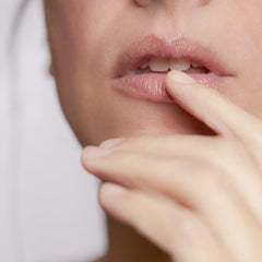Blue Lagoon microalgae bioactive powder visual highlights nourishing lip care.