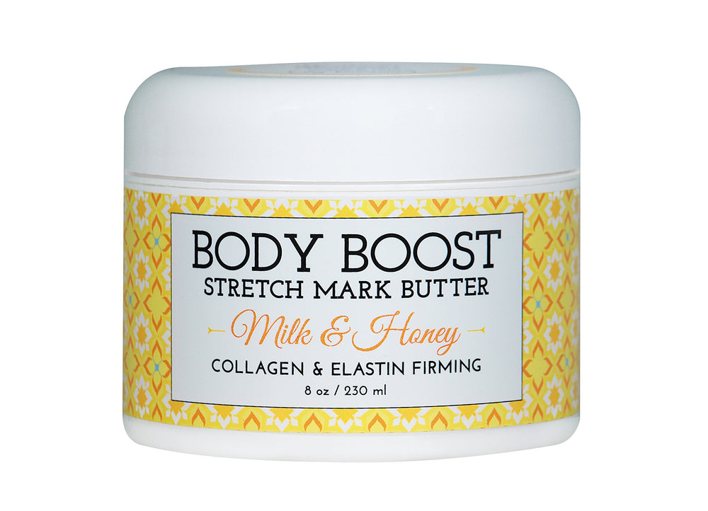 Body Boost Milk & Honey Stretch Mark Butter bottle closeup supports skin elasticity during pregnancy.