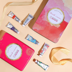 BODY & EARTH Cherry Blossom hand cream bottle softens skin with a delicate scent.