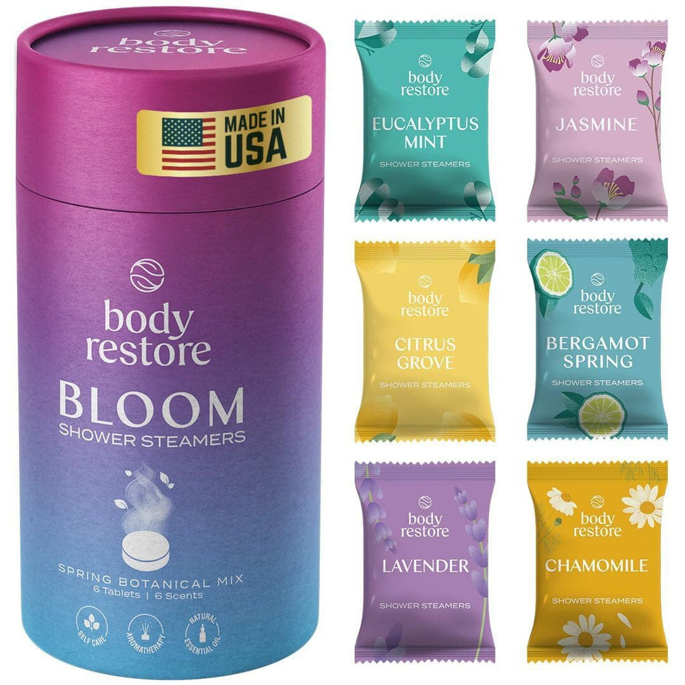 Body Restore Bloom shower steamers in a tube with citrus-mint aroma for daily relaxation.