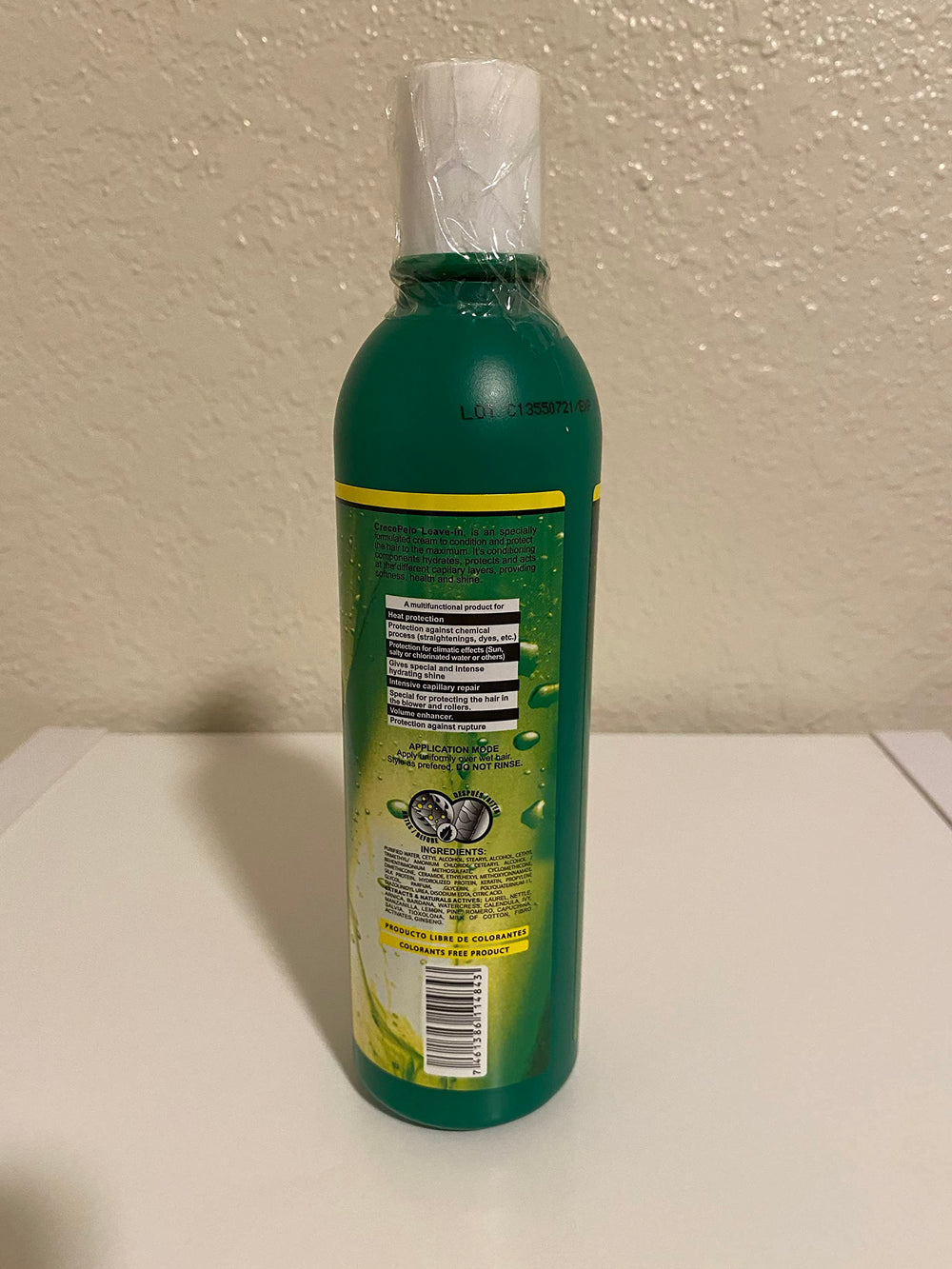 BOÉ Crece Pelo product in hand showing gentle repair for dry hair