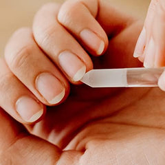 Bona Fide Beauty glass cuticle pusher in silver with bevelled tip for gentle back push