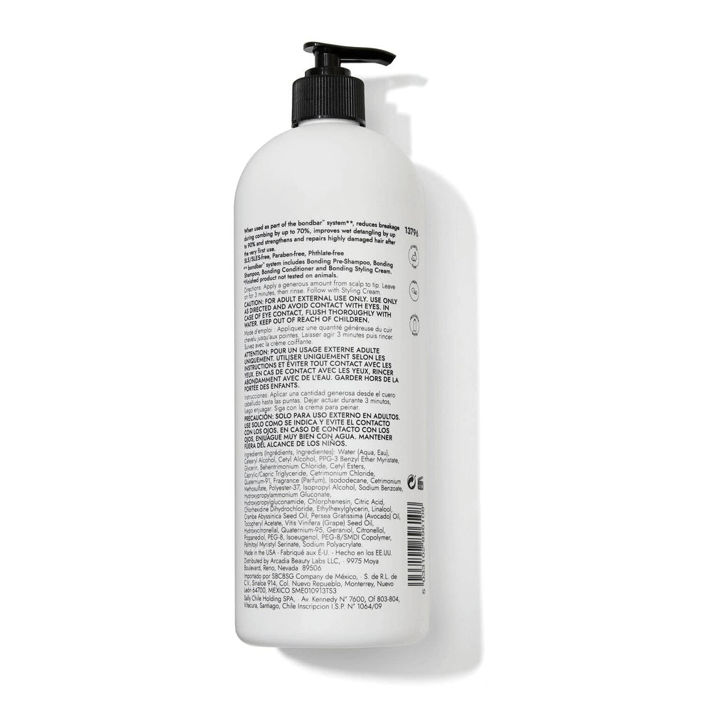 Bondbar conditioner applied from scalp to tips for deep conditioning.