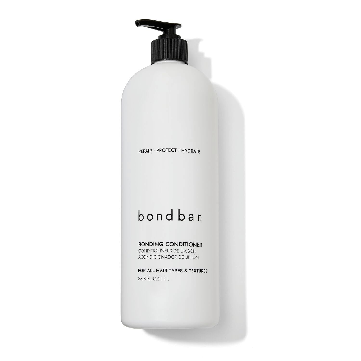 Bondbar conditioner bottle on shelf showcases bond repair and hydration for damaged hair.
