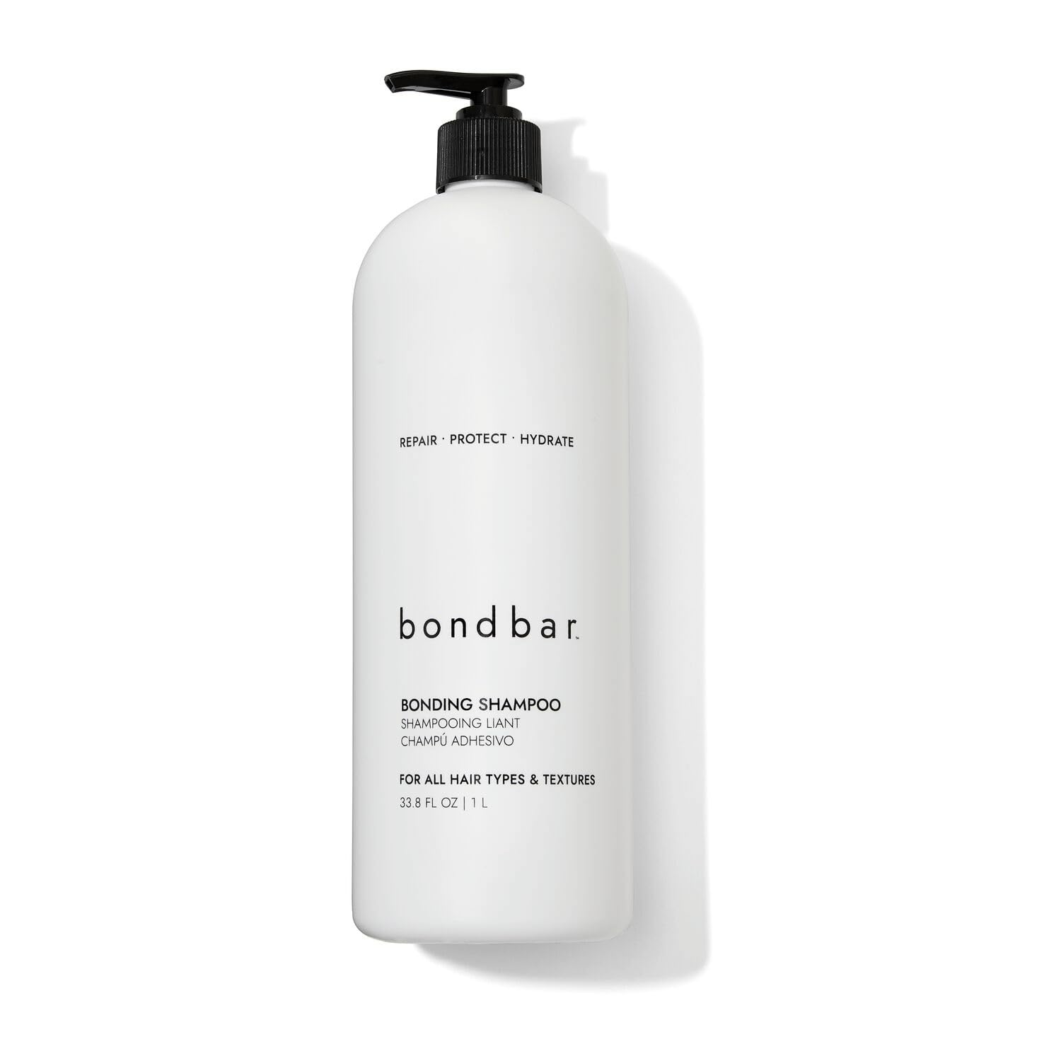 Bondbar Repairing Shampoo bottle with pump highlighting hydration for all hair textures.