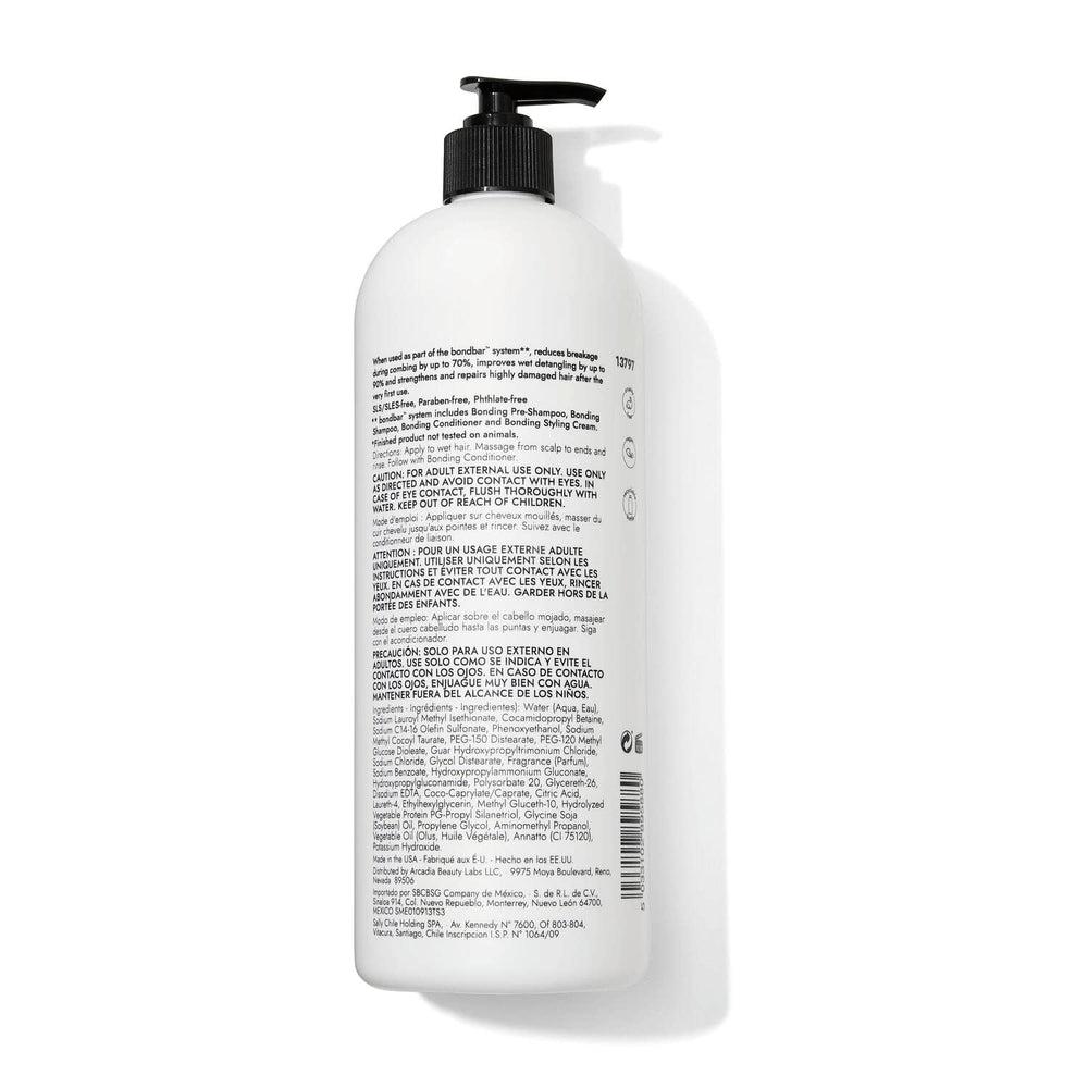 Bondbar Repairing Shampoo rich lather close-up showing frizz protection and shine.