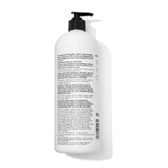 Bondbar Repairing Shampoo rich lather close-up showing frizz protection and shine.