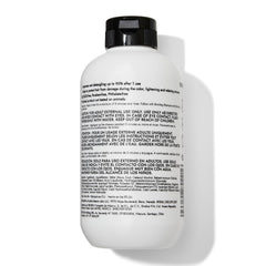 Bondbar Treatment hair texture close-up shows smooth, frizz-free feel after use.