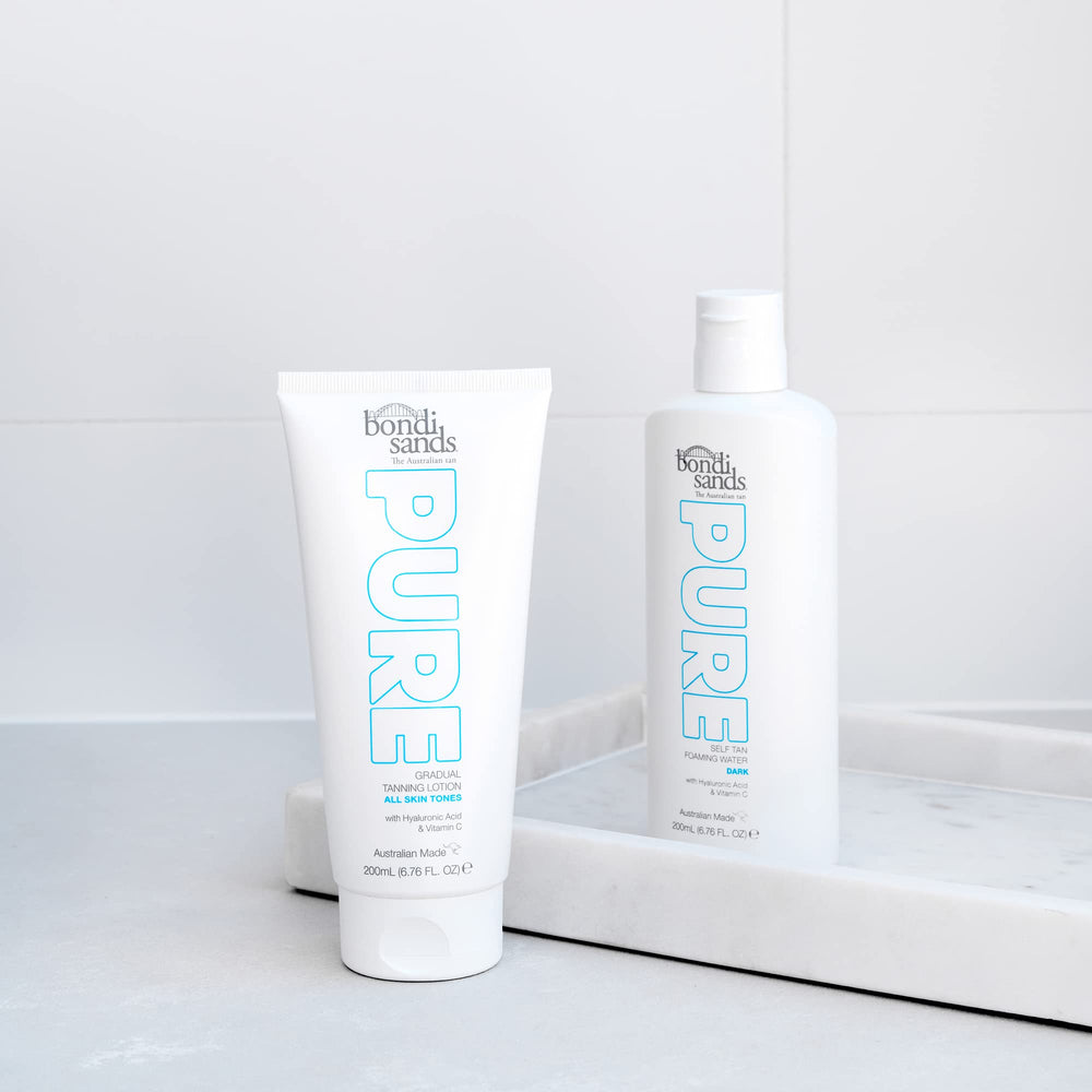 Bondi Sands PURE application shot highlights even streak-free application for a natural tan.
