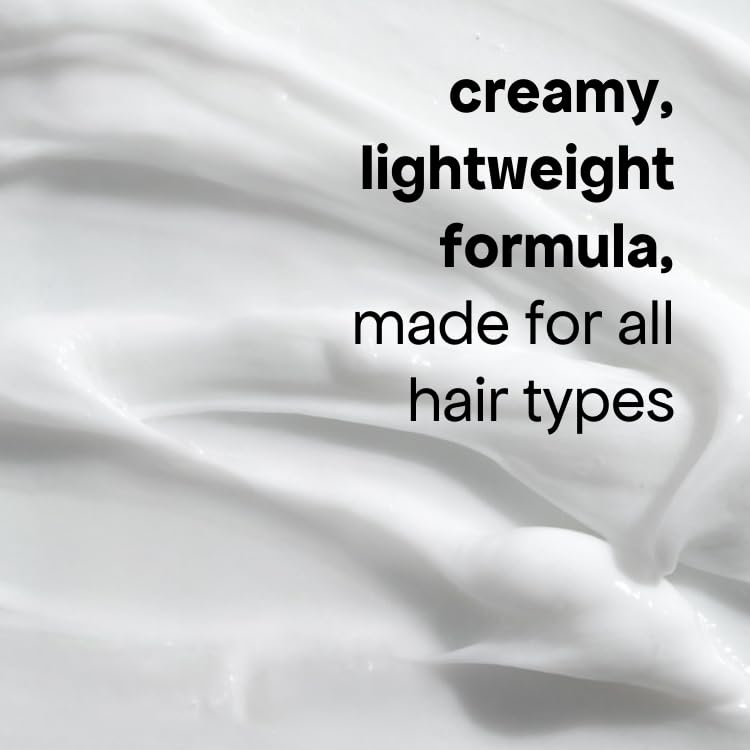 Bondiboost HG conditioner on hair strands showing soft, detangled look.