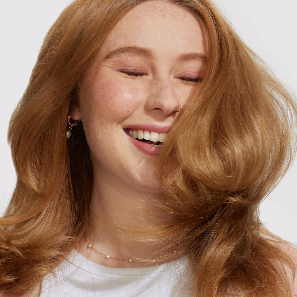 BONDIBOOST Thickening Shampoo application shot shows easy scalp massage for even coverage
