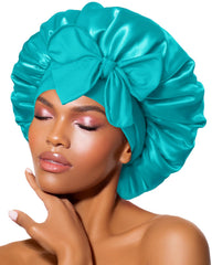 BONNET QUEEN silk bonnet aqua blue on head for curl protection and comfortable sleep.