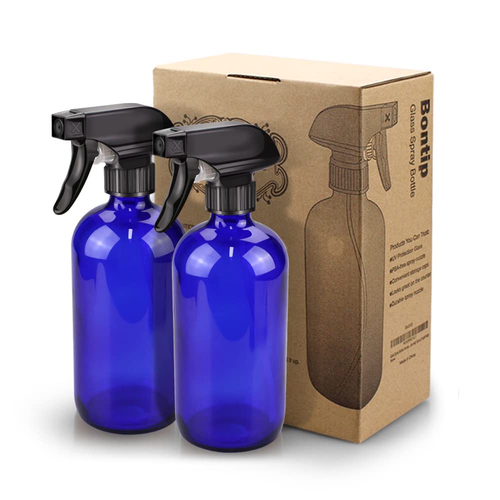Aromatherapy and hydration mist prepared in blue glass for personal care.