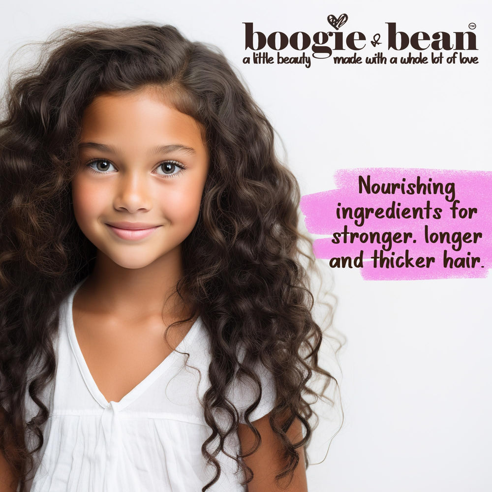 Boogie and Bean Kids Hair Oil smoothing hair during detangling moments.