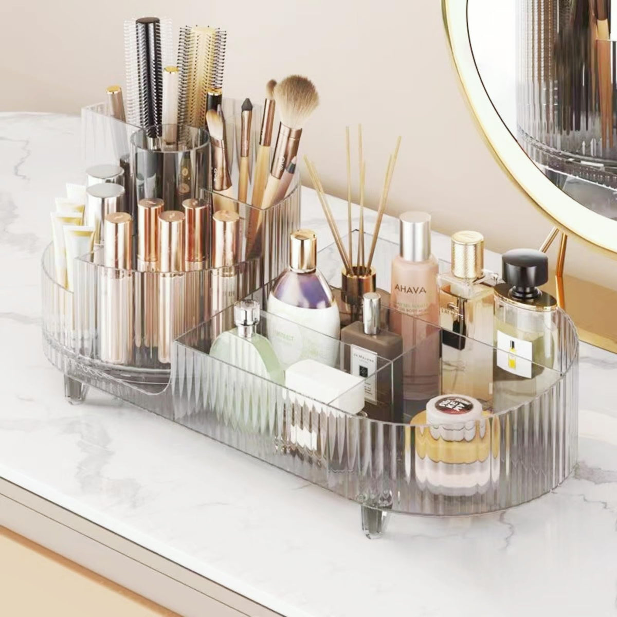 Booklov rotating makeup organizer crystal clear front view showing organized brushes and cosmetics for easy access
