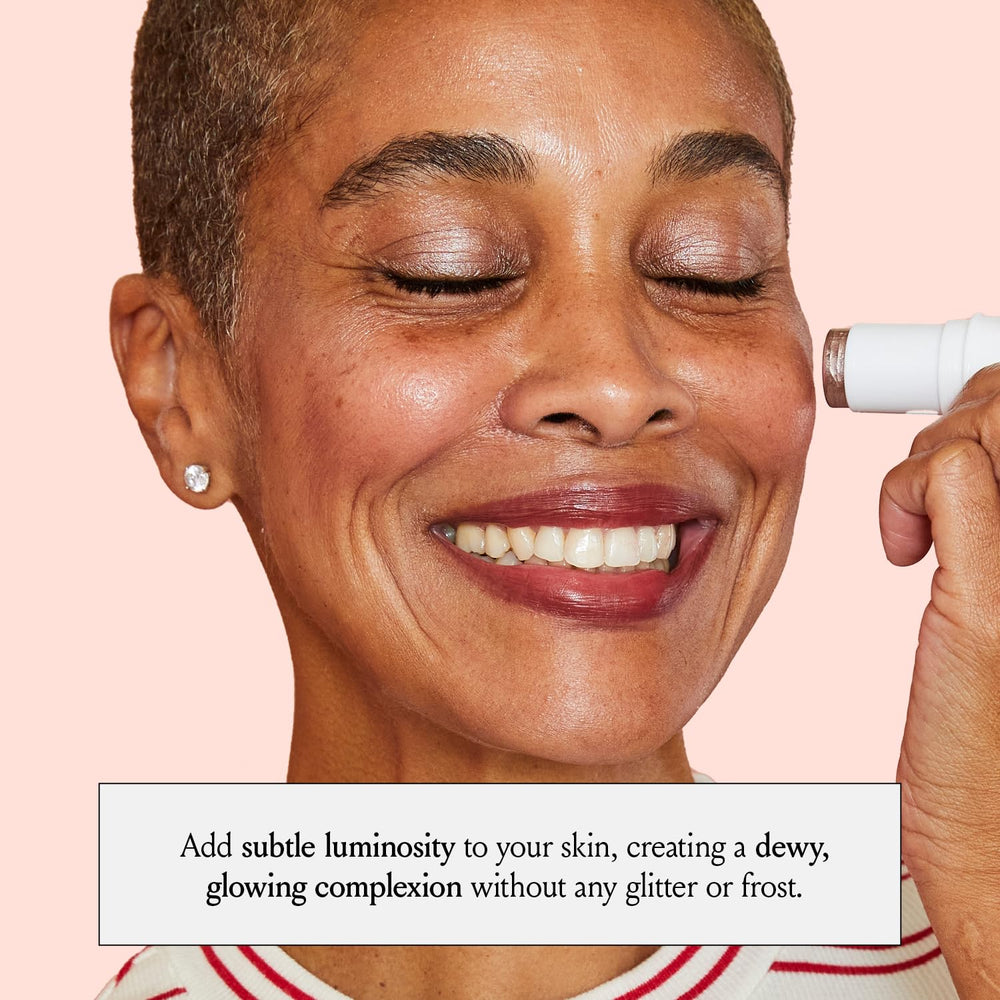 Boomstick Glimmer highlighter stick in-use image shows creamy texture for easy blending.